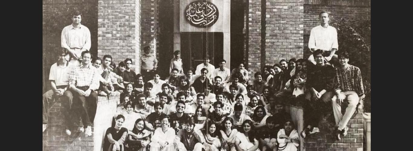 A black and white picture of the BSC Class of 1998 on the steps of the academic block when they were students at LUMS